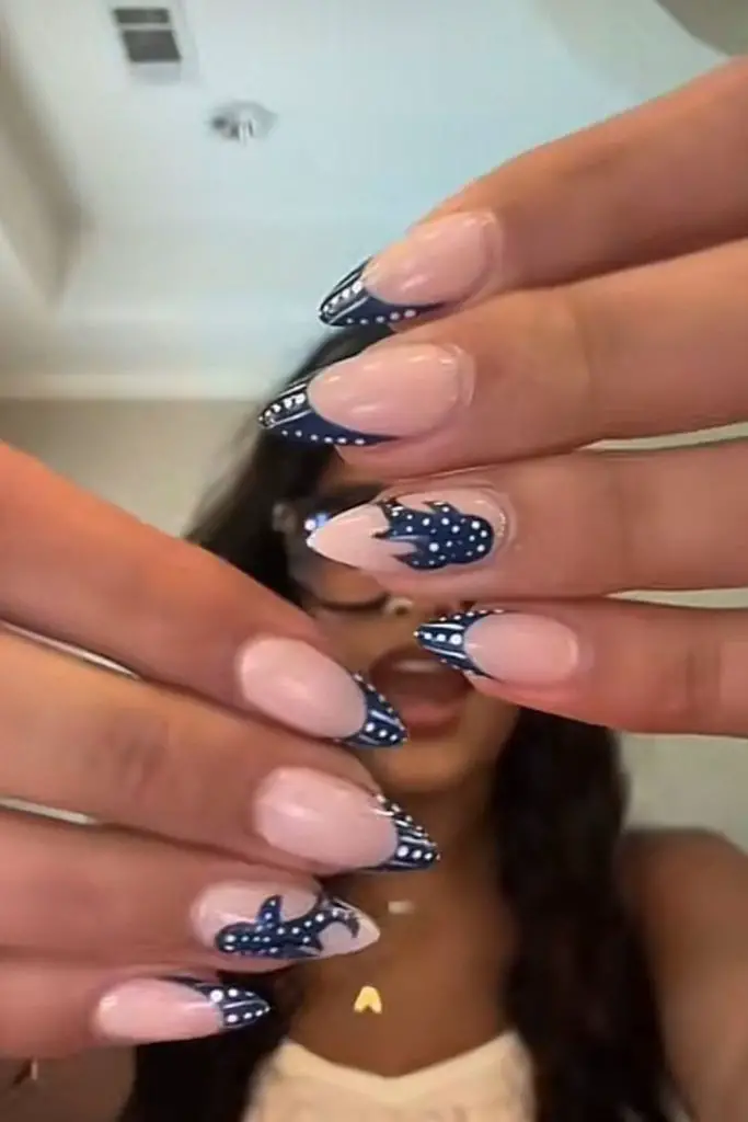 Royal blue nails with dotted chaos.