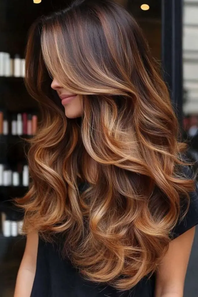 Sunset caramel tones through long hair