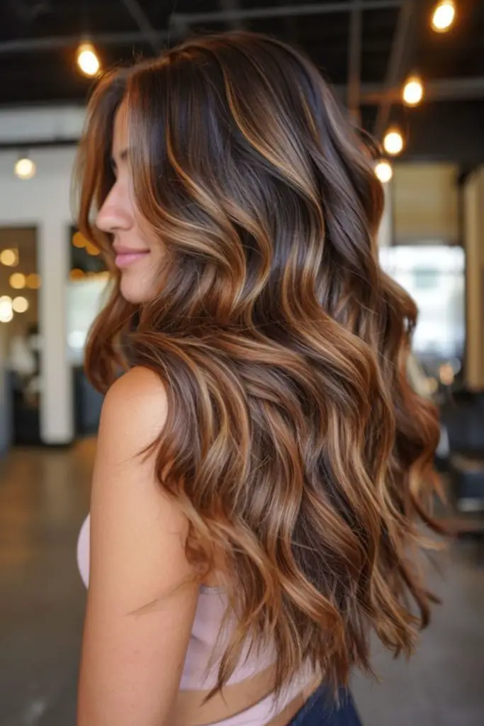 Warm caramel waves over chestnut base.