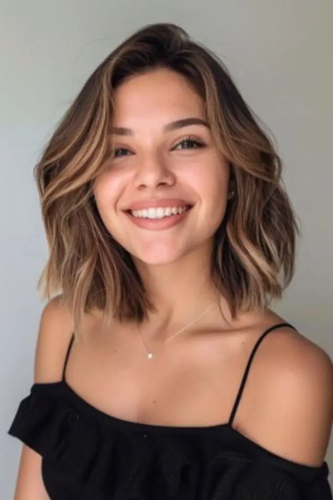 Long bob shadowing cheeks softly