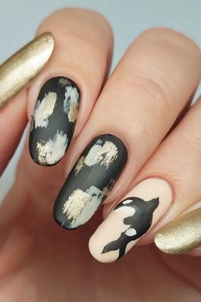 Black nails with luminous white spots.