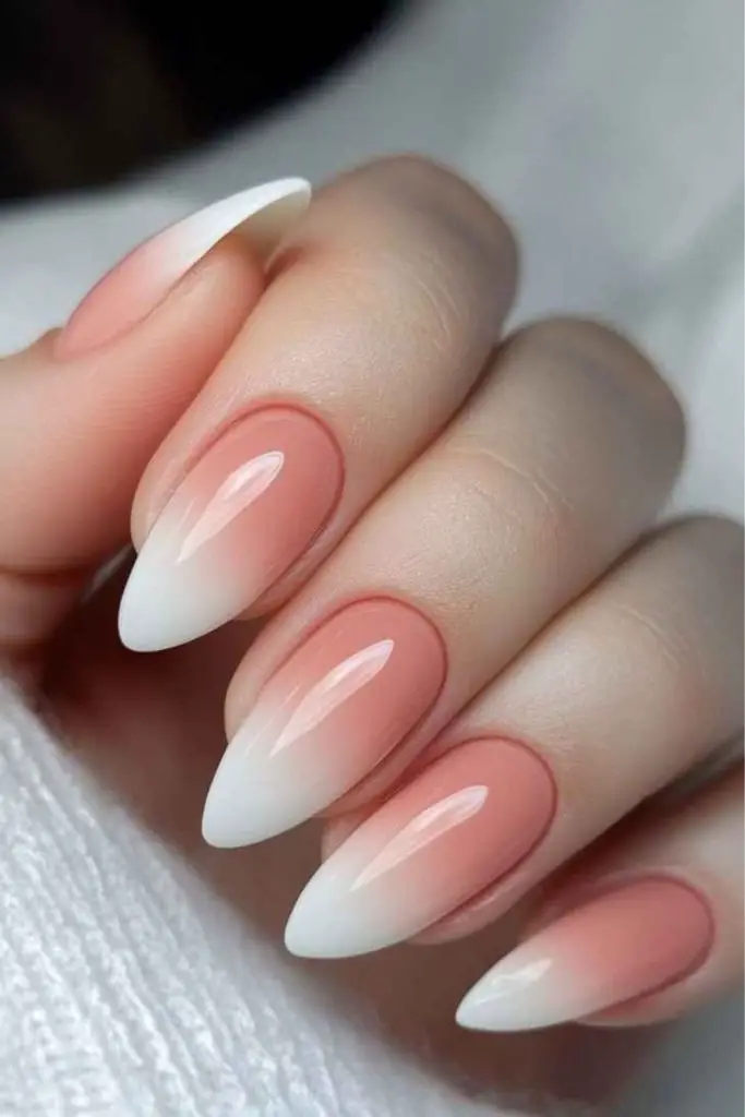 Blush-coral nails with rose detail

