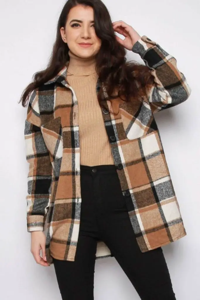 Patchwork puffer over roll-neck knit.