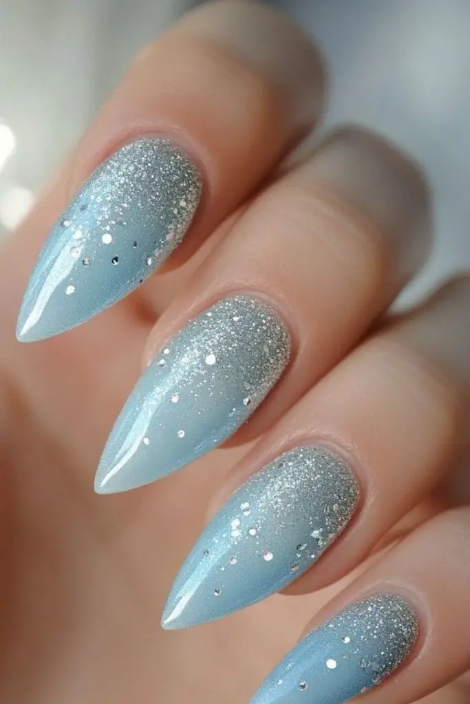 Icy blue nails silver shimmer minimalist style