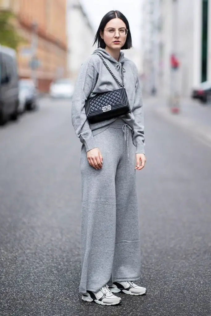 Heather-grey fleece set with sneakers.