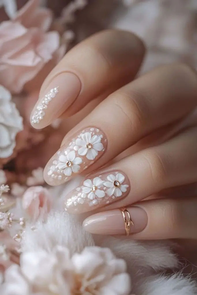 Baby’s breath bliss delicate wedding nails.
