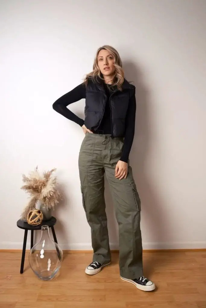 Cropped shearling jacket with cargo pants.