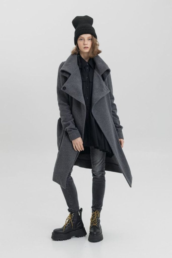 Charcoal trench coat layered autumn outfit.