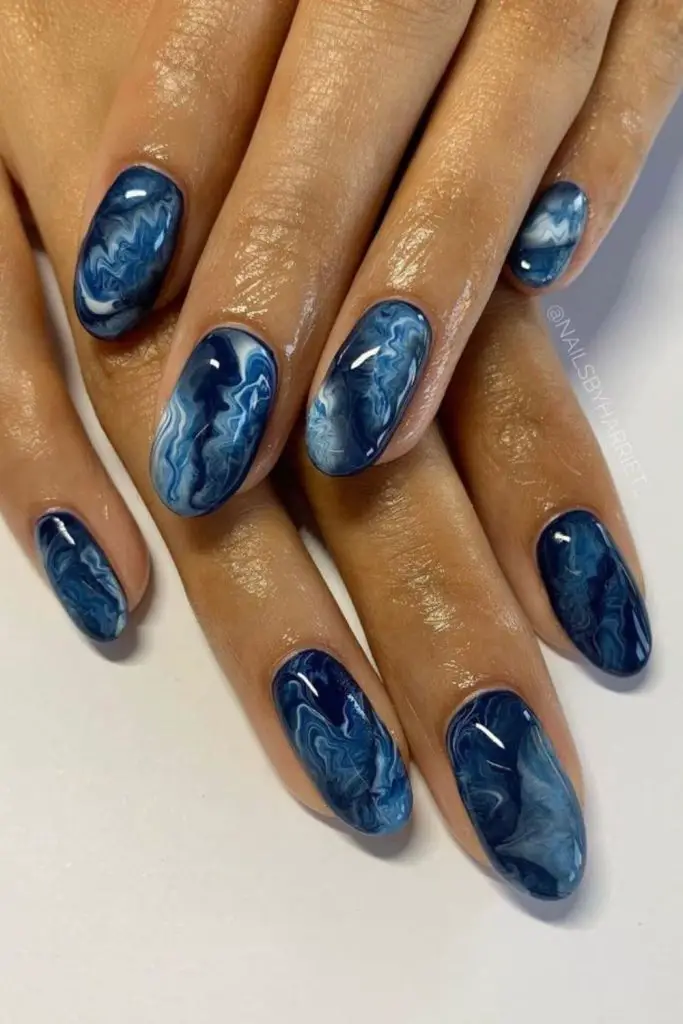 Celestial blue marbled cosmic nail style
