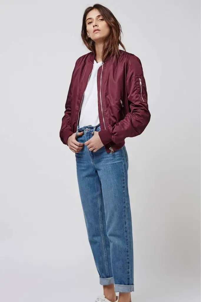 Burgundy bomber over plain shirt.