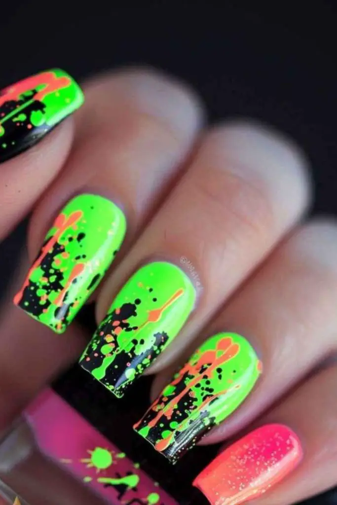 Firefly glow neon sparkle nails.