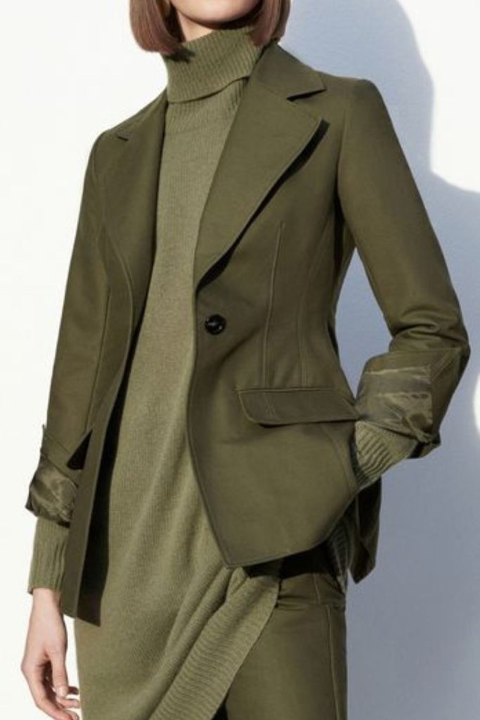 Olive green layered forest-inspired look.