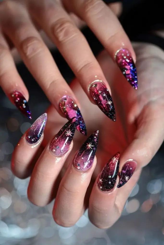 Galactic purple glitter cosmic stiletto nails