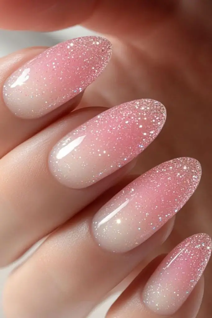Glassy pink glow luminous wedding nails.