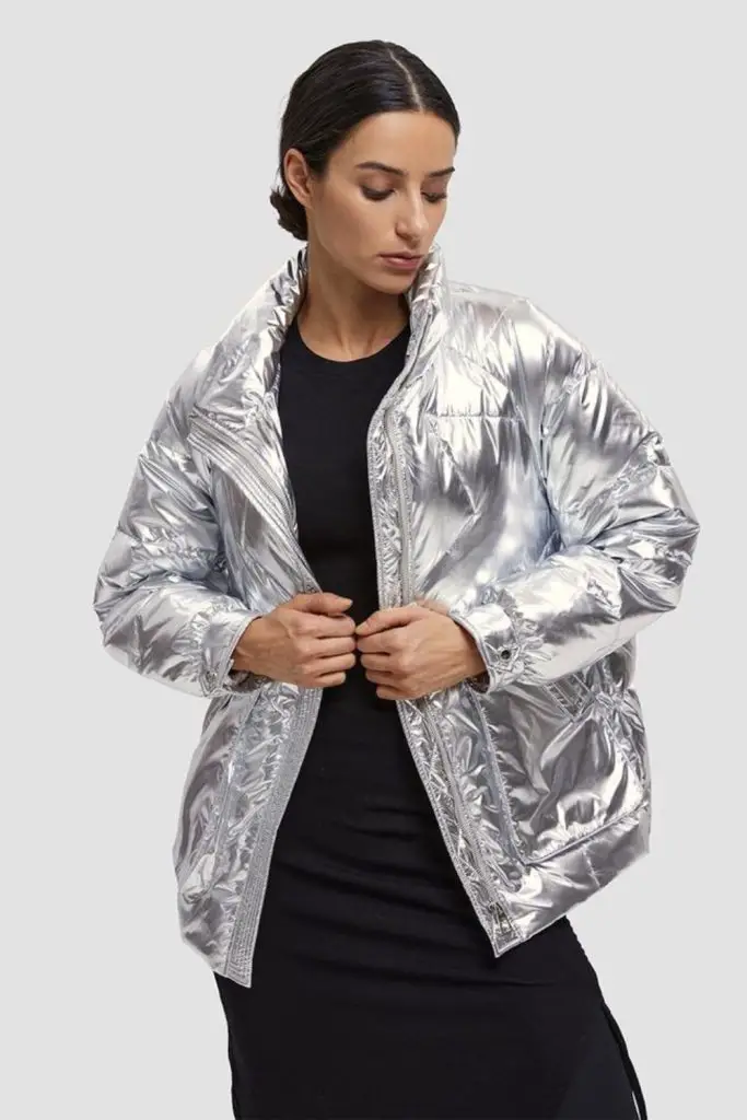 Metallic puffer over knit dress.