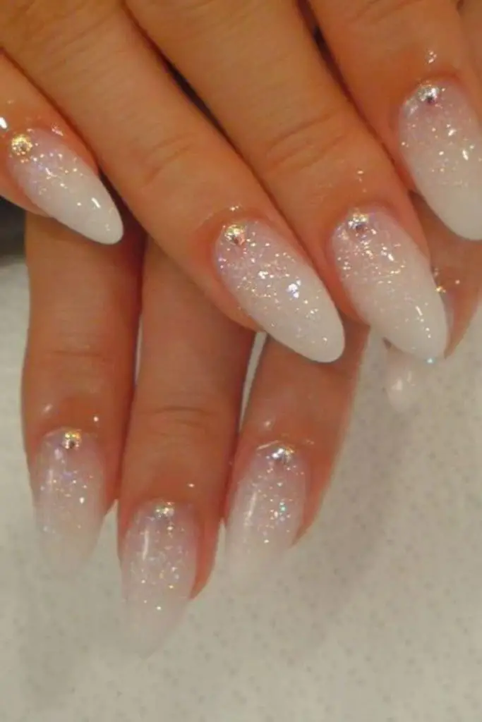 Glitter veil ombre elegant bridal nails.