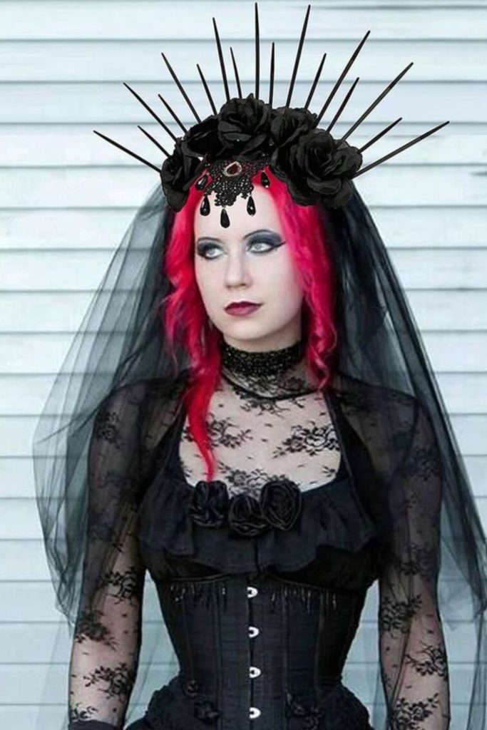 Gothic bride with scarlet veil.