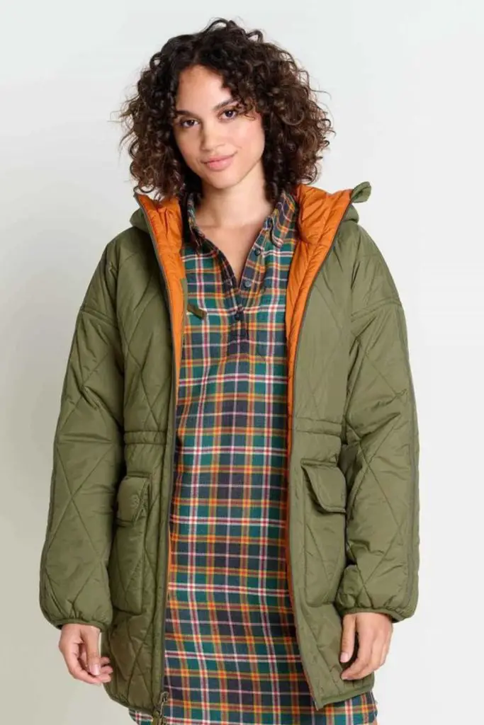 Rain parka over plaid overshirt.