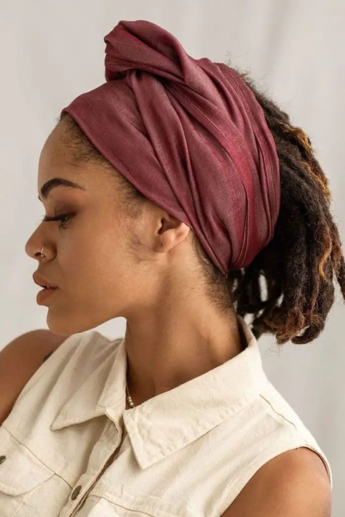Scarf-wrapped locs with ends exposed