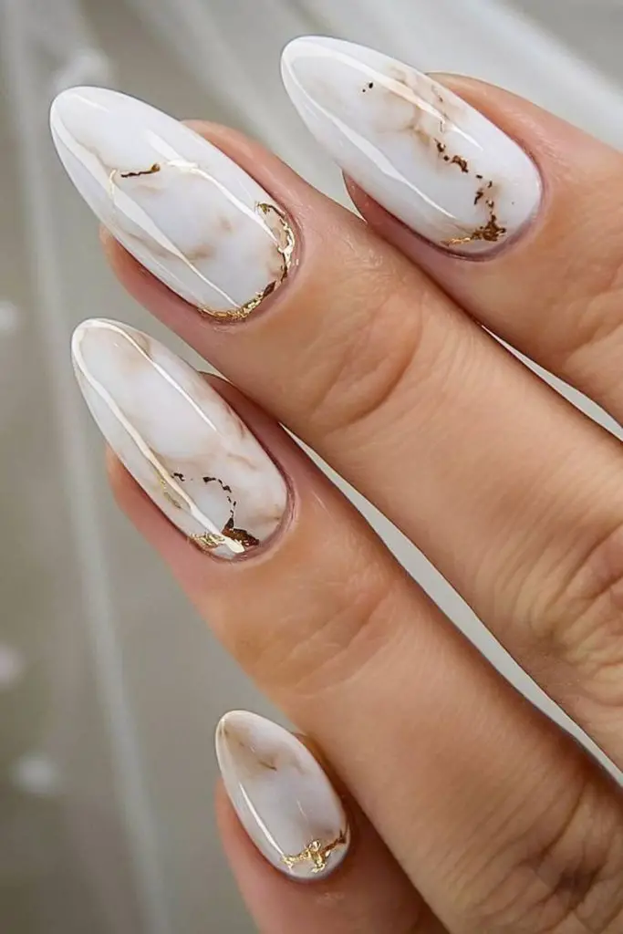Marbled ivory graceful wedding nail design.