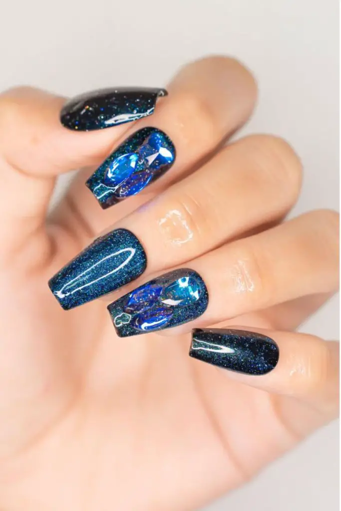 Midnight glitter storm dramatic glitter nails