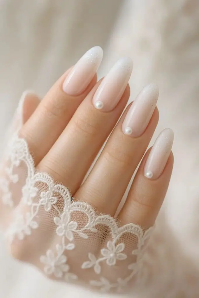 Milky cloud whisper ethereal bridal nails.