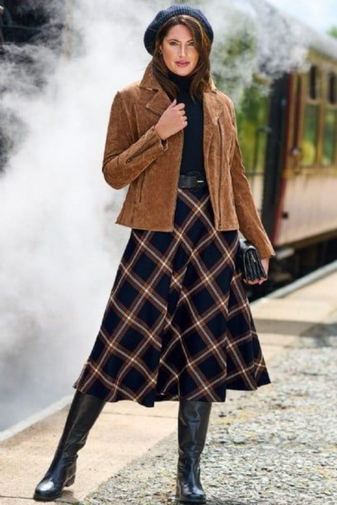 Plaid skirt layered cozy autumn fashion.