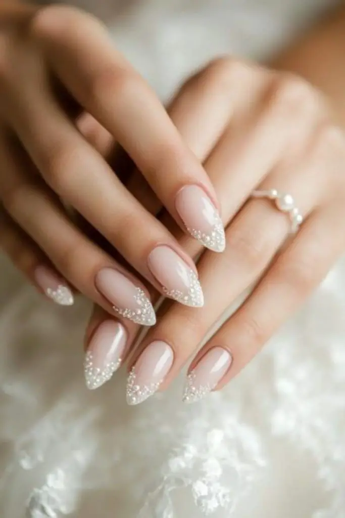 Moonlit French arc bridal nail design.