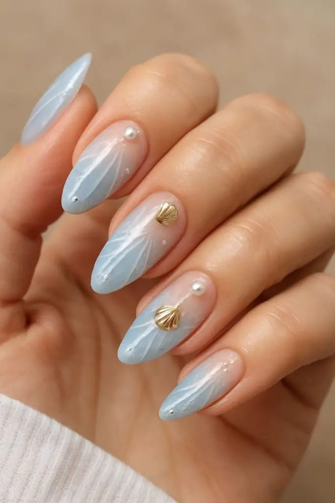 Ocean pearl mirage aqua bridal nails.