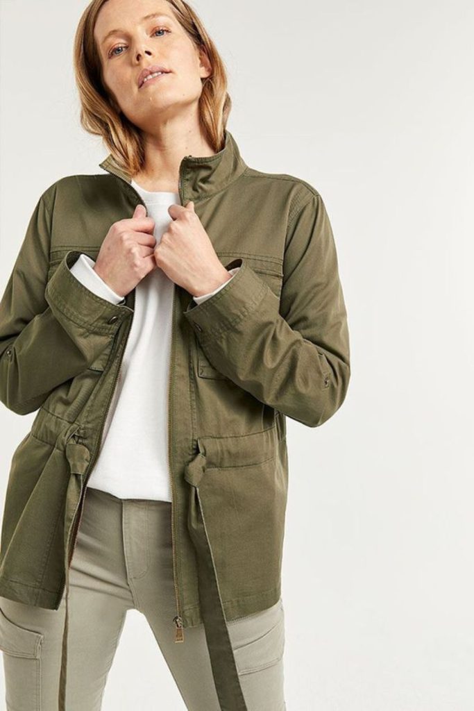 Olive safari jacket casual layered fashion.