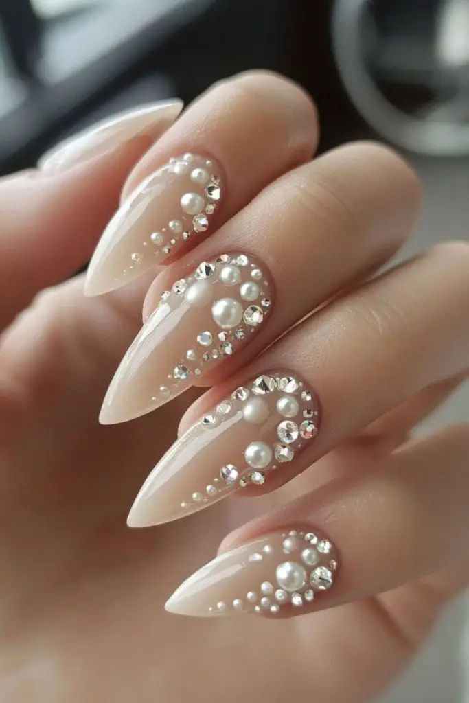 Pearl drop classic ivory wedding nails.