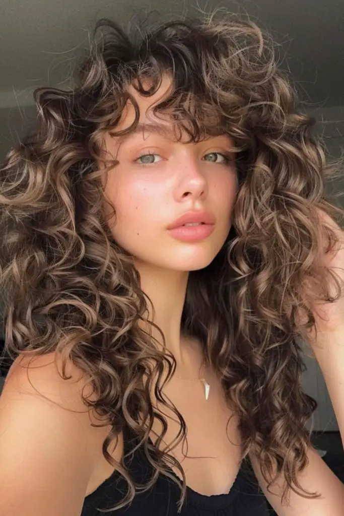 Petal-soft curls framing delicate fringe