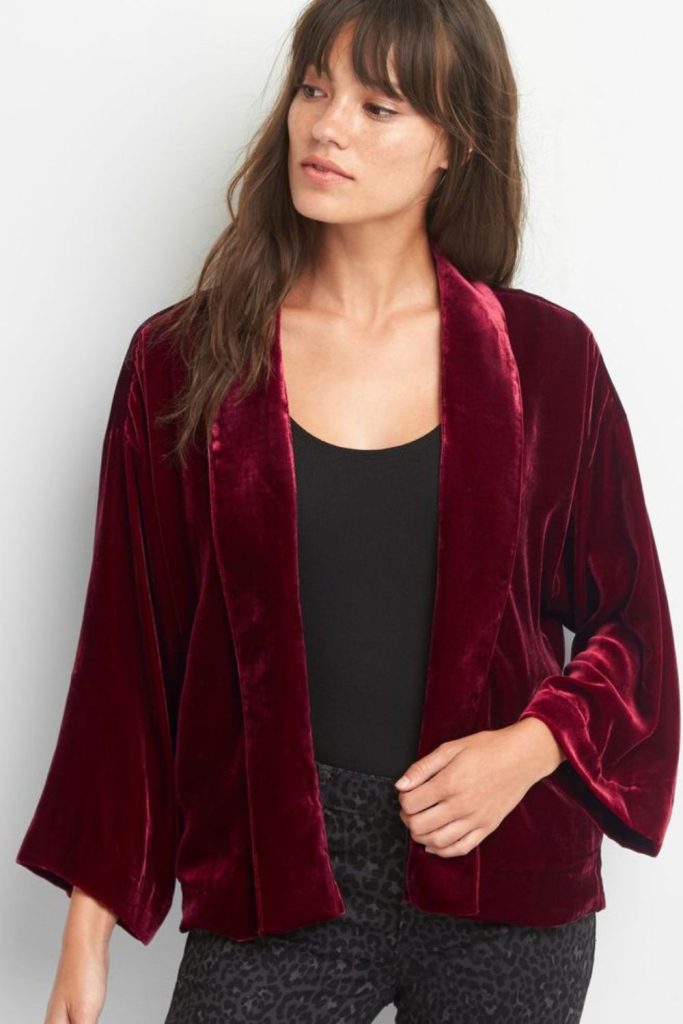 Plum velvet jacket layered chic outfit.