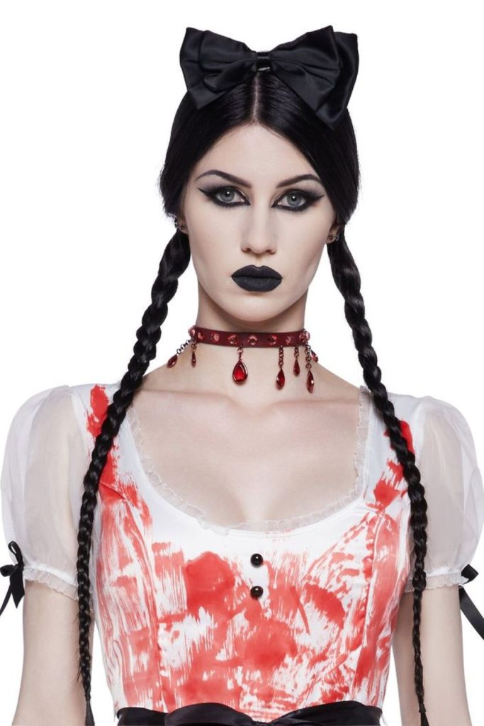 Possessed doll horror with braided hair