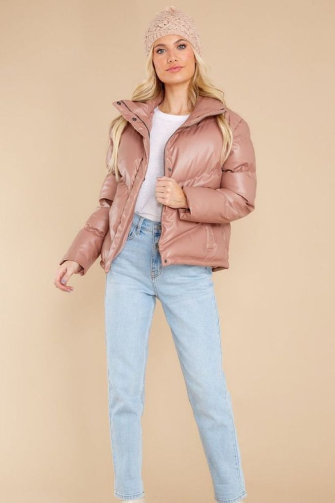 Cropped puffer styled with high-waist jeans
