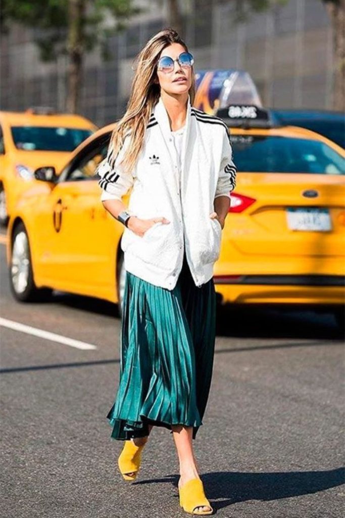 Track jacket flowing skirt sneakers
