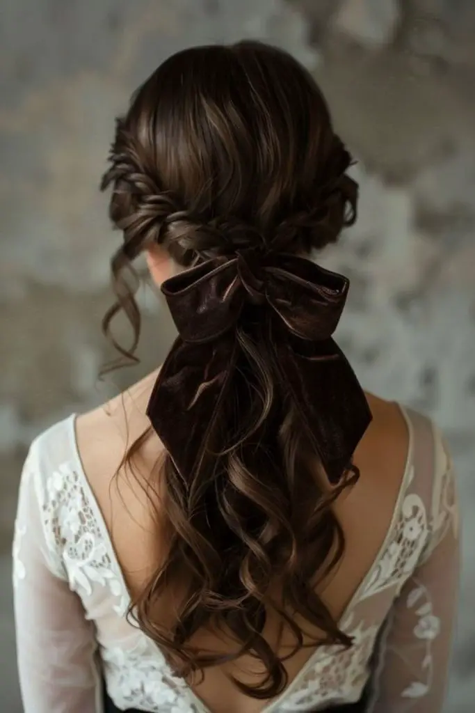 Ribbon-tied twist with ripple curls