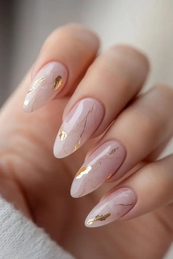 Rose gold vein marble bridal nails.