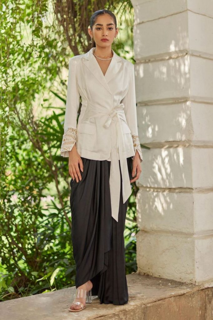 Angular jacket soft draping skirt look