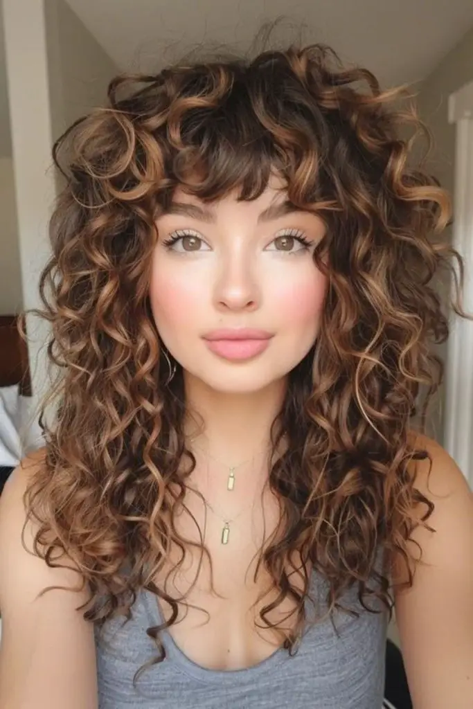 Breezy curls with soft flicked fringe