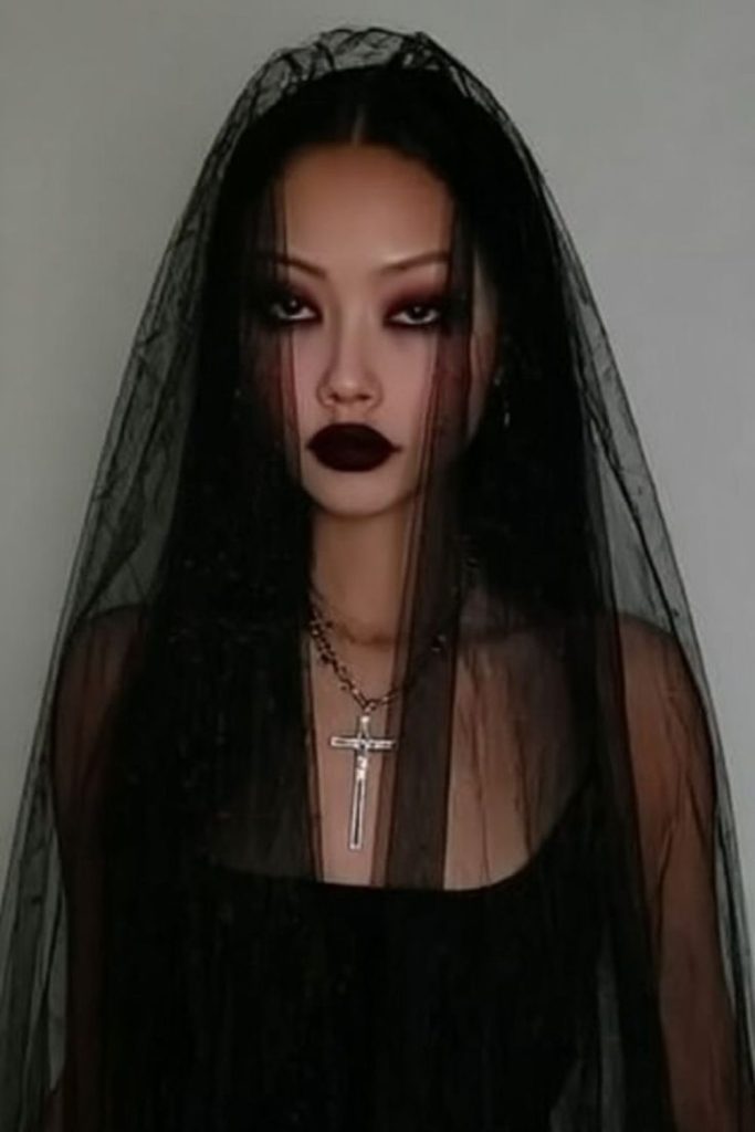 Sinister librarian shade with raven hair