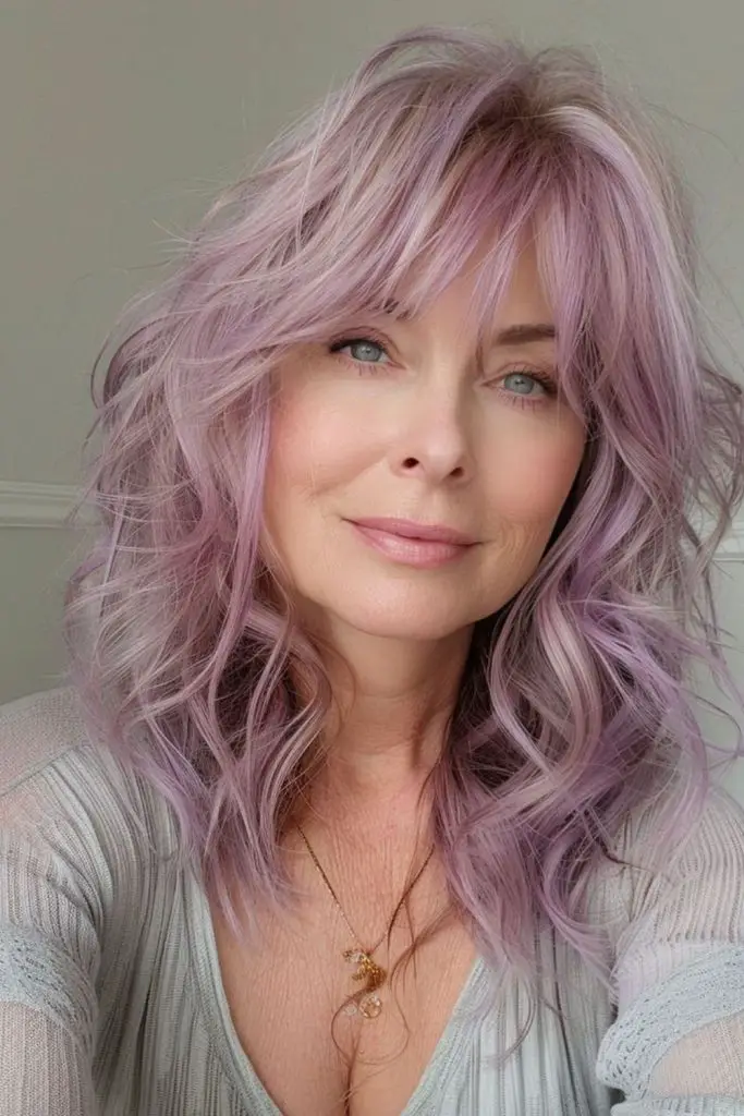 Smoky lilac layered hair with bangs.