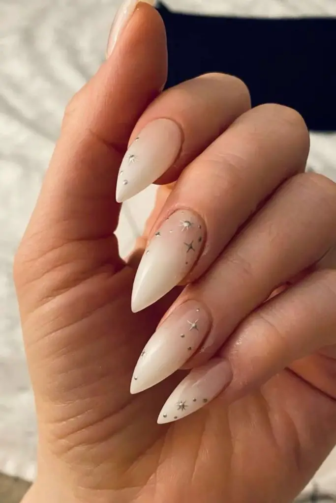 Stardust frost tips glitter wedding nails.