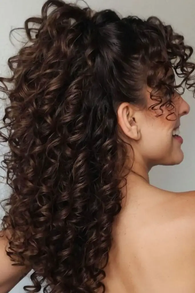 Crown twists unraveled into fluffy curls