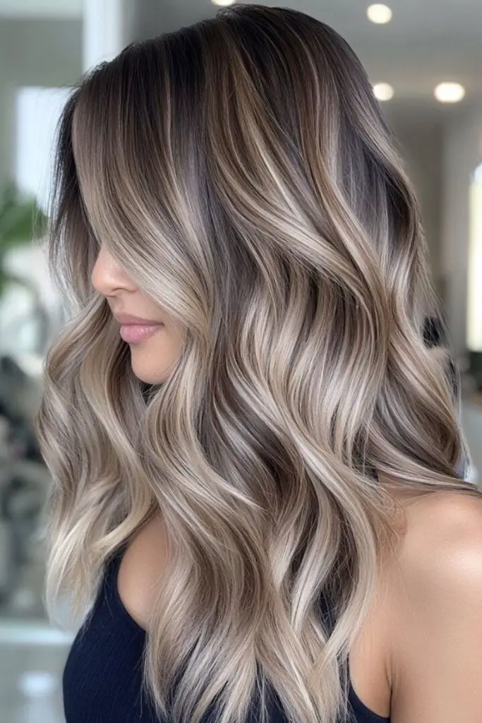 Dirty blonde tones with smoky roots