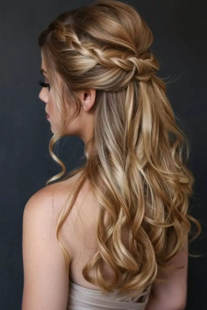 Honey blonde twist with tumbling curls