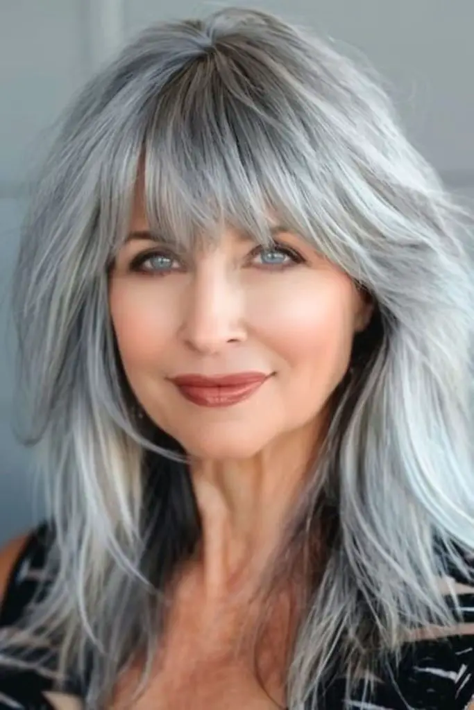Frosty silver shag with jagged bangs.