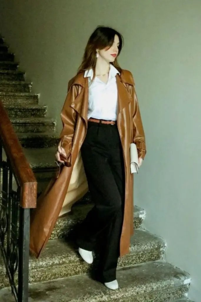 Rust trench coat with silk blouse