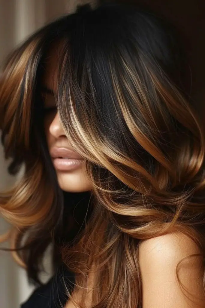Autumn caramel fire highlights on brunette