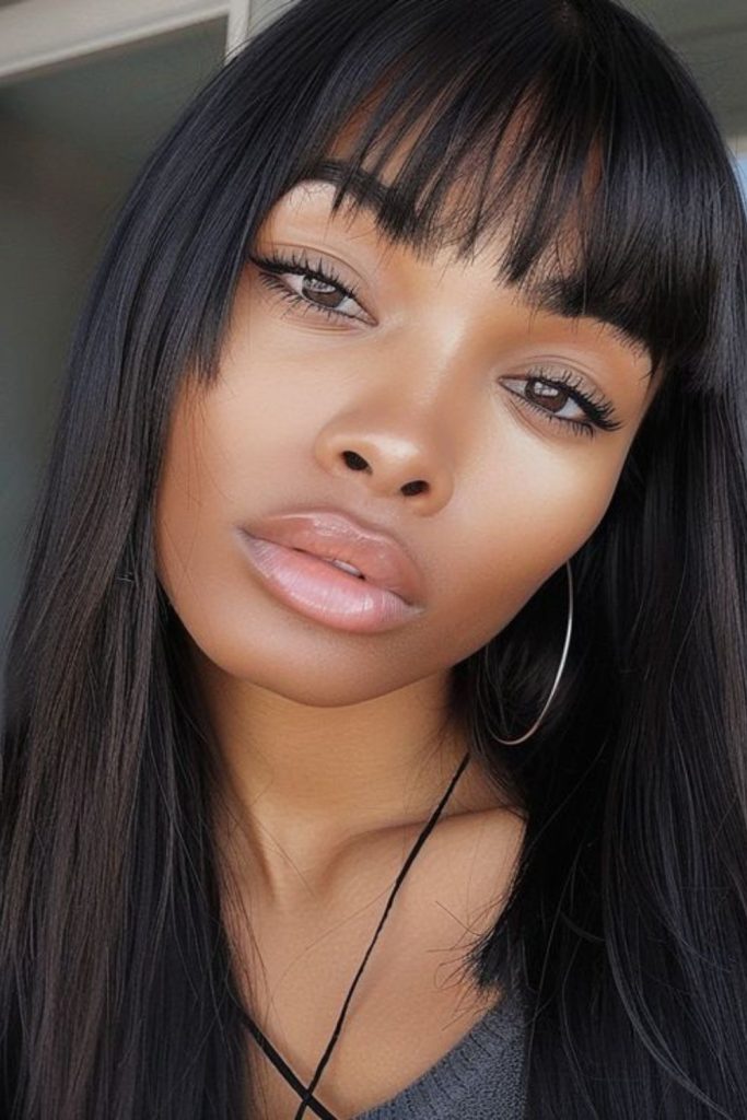 Blunt fringe drama with straight bangs